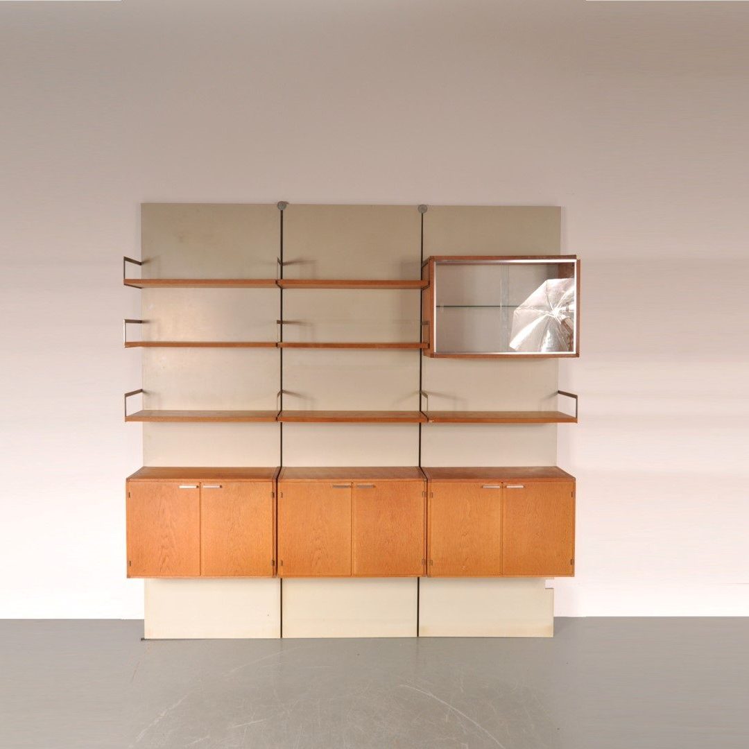 1950’s Unique wall mounted system cabinet from the japanese serie Produced: Pastoe/ Netherlands Design: Cees Braakman