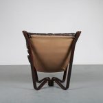 m23835 1970s Viking chair on brown wooden base with brown leather cushions Jim Myrstad Brunstad Møbelfabrikk / Norway