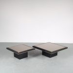 m25474 1980s black coffee table on thick black square base with small brass lining and black thick glass top small