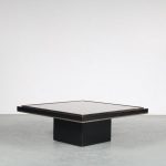 m25475 1980s black coffee table on thick black square base with small brass lining and black thick glass top big
