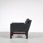 m25588 1960s Pair of easy chairs on wooden base with black skai upholstery George van Rijck Beaufort, Belgium