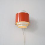 L4759 1970s Wall lamp in white with orange metal