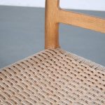 m25845 1970s Model 68 oak wooden dining chair with armrest Moller Moller, Denmark
