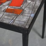 m26054 1950s Small side table on black metal base with tile top with artwork Belgium