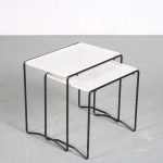 m26136 1960s Pair of nesting tables on black metal base with white metal perforated tops Artimeta, Netherlands