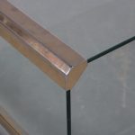 m26079 1970s Large double layered coffee table on wheels in glass with brass Pierangelo Gallotti Gallotti & Radice, Italy