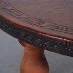m26194 1970s Round coffee table, leather covered top with wooden base Angel Pazmino Ecuador
