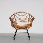 m26299 1950s Nice styled rattan easy chair on black metal base Rohé, Netherlands