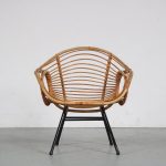 m26299 1950s Nice styled rattan easy chair on black metal base Rohé, Netherlands