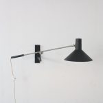 L4947 1960s Model 7105 wall lamp with black metal Hoogervorst Anvia, Netherlands