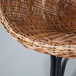 m25621 1950s Wicker easy chair on black metal V-shaped base A Bueno de Mesquita Rohé / Netherlands