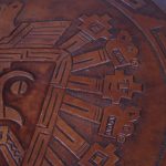 m26548 1960s Rare carved leather pouf Angel Pazmino Ecuador