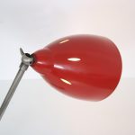 L5080 1950s Desk lamp on black metal base with ball and red metal hood, Netherlands