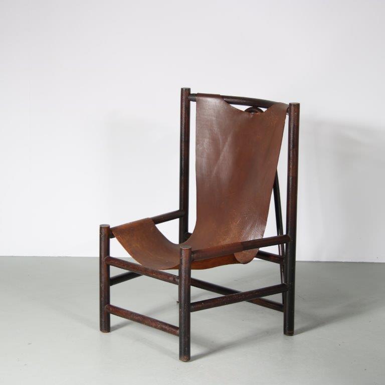 INC142 1970s Sling chair, dark wooden base, thick leather seat Netherlands Gerard