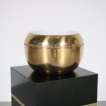 m27014 1960s Brass ice bucket in pear shape on black laminated console with brass details Italy