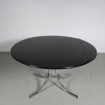 m27052 1980s Extendible round to square dining table Hilton on chrome base with black wooden top Lasko, Germany