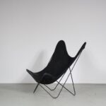 m27283 1950s Hardoy style Butterfly chair on black metal frame with black canvas seat Beijenkorf, Netherlands