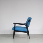 m27299 1960s Lounge chair on black painted wooden base with blue and yellow fabric cushions Italy