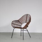 m27272 1950s Rare model rattan easy chair on black metal base Rohé, Netherlands