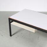 m27426 1960s Rectangular coffee table on black metal base with white wooden magazine shelves and white laminated top Cees Braakman Pastoe, Netherlands