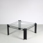m26514 1980s Square coffee table on black metal base with glass top Netherlands
