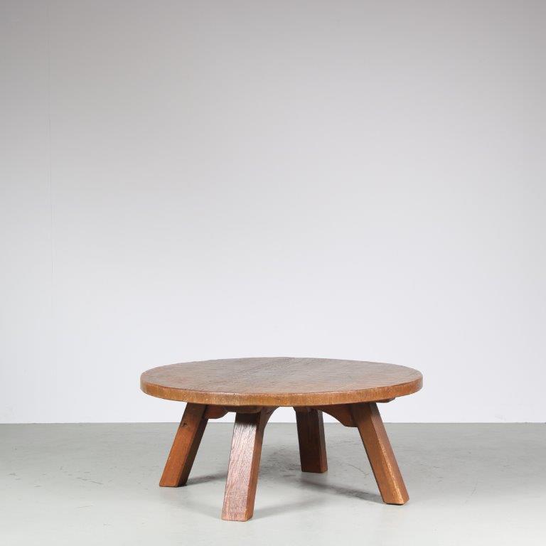 m27535 1970s Brutalist round oak coffee table Netherlands