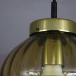 L4797 1960s Amber coloured glass hanging lamp with brass details Raak Netherlands