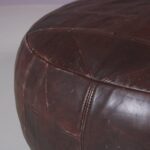 m27566 1970s Large round patchwork leather pouf De Sede, Switzerland