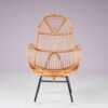 m27678 1950s Rattan easy chair on black metal base / Gebroeders Jonkers, Netherlands