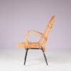 m27678 1950s Rattan easy chair on black metal base / Gebroeders Jonkers, Netherlands