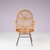 m27678 1950s Rattan easy chair on black metal base / Gebroeders Jonkers, Netherlands