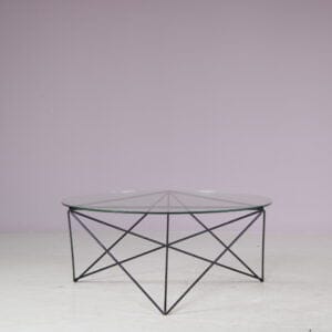 m27770 1960s Round coffee table on black wire metal base with glass top / Switzerland