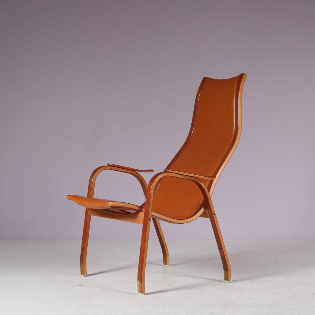 m26566 1950s Kurva lounge chair with new upholstery Yngve Ekström Swedese, Sweden