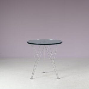 m27820 1990s Tom Dixon style side table on wire metal base with thick round glass top Italy