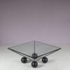 m27824 1980s Square coffee table on black metal base with black wooden ball shaped feet and glass top / Italy