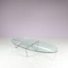 m27846 1980s Oval coffee table with stainless steel base and thick glass top Netherlands