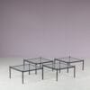 m27860 1950s Set of four stacking display tables in black metal with glass tops / Netherlands