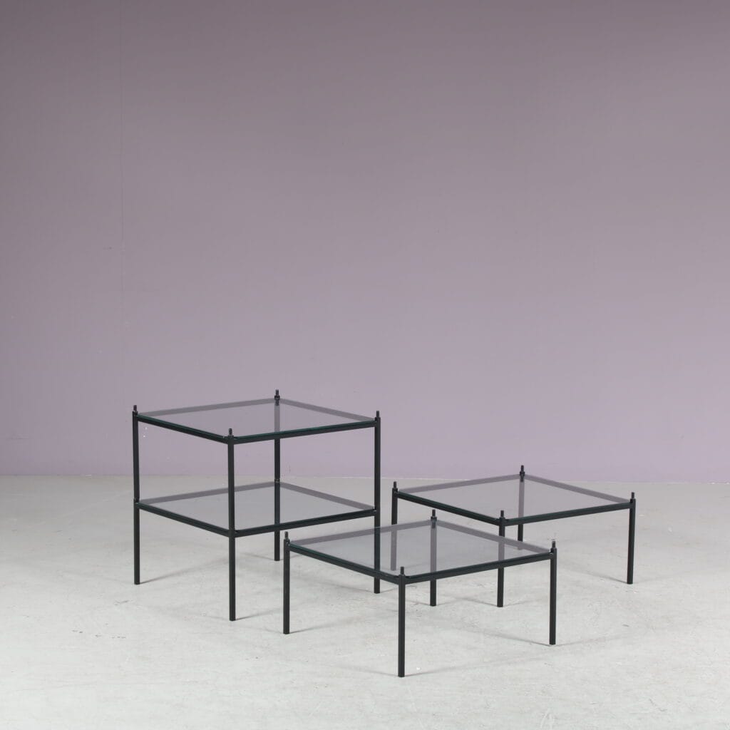 m27860 1950s Set of four stacking display tables in black metal with glass tops / Netherlands