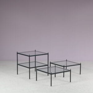 m27860 1950s Set of four stacking display tables in black metal with glass tops / Netherlands