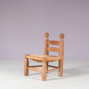 m27886 1950s Low fire side chair in oak wood with rush seat attributed to Charles Dudouyt, France