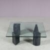 m27894 1980s Coffee table with four marble feet and glass top in the style of Vignelli (Metafora) / Italy