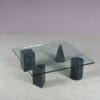 m27894 1980s Coffee table with four marble feet and glass top in the style of Vignelli (Metafora) / Italy