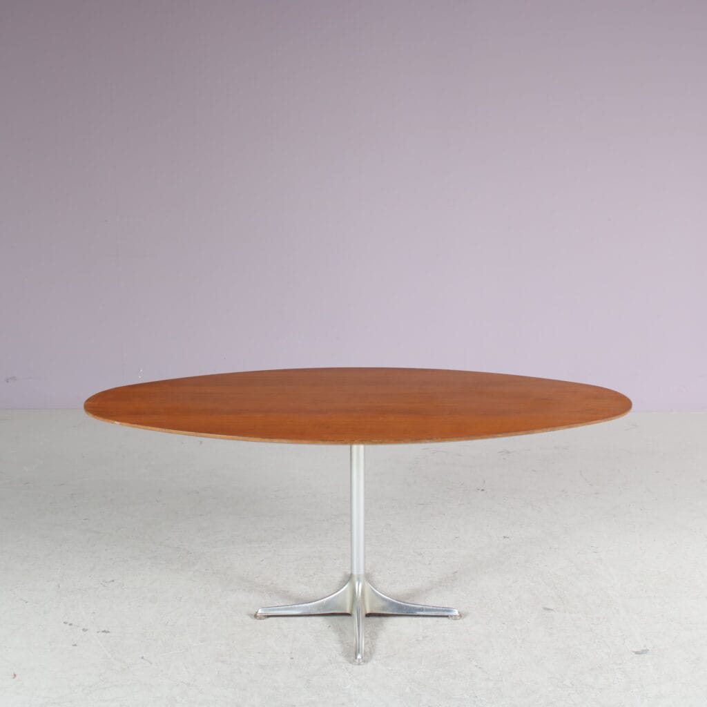 m27975 1960s High oval shaped coffee table on aluminium base with walnut top Germany