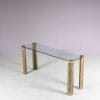 m27961 1980s Console table, thick glass top with heavy brass legs Peter Ghyczy Ghyczy, Netherlands