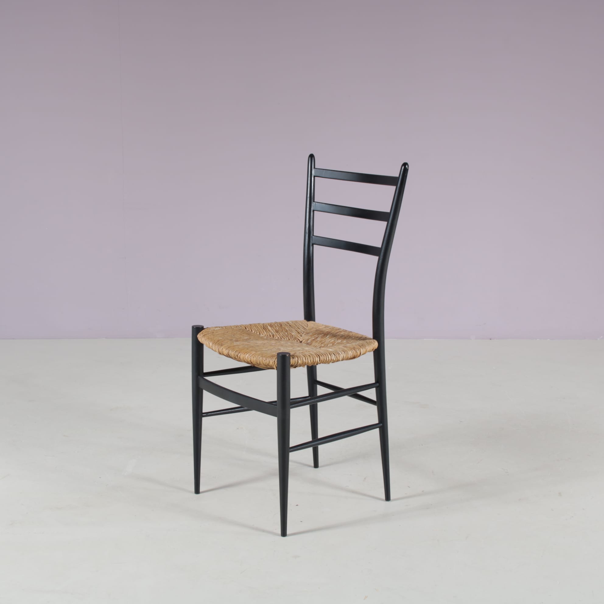 m28108 1950s Set of 4 Spinetto dining chairs in black wood with rush Chiavari, Italy