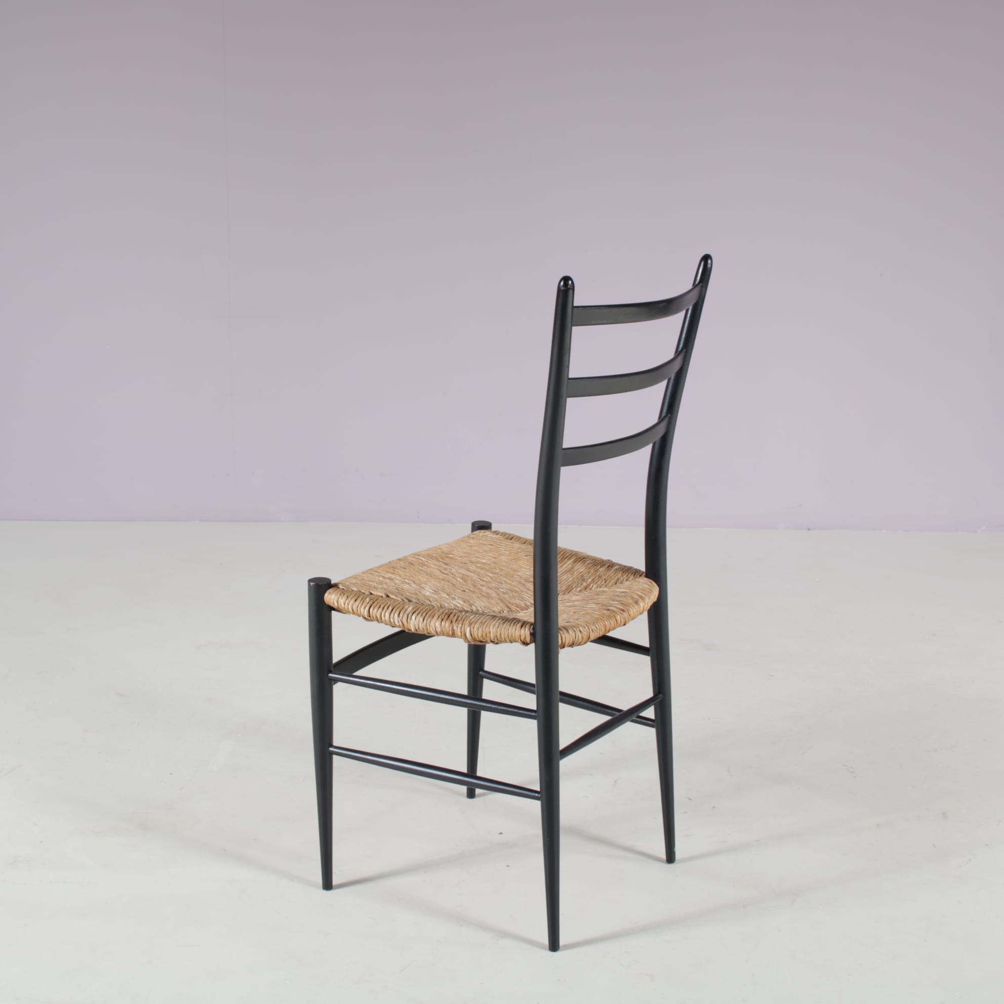 m28108 1950s Set of 4 Spinetto dining chairs in black wood with rush Chiavari, Italy