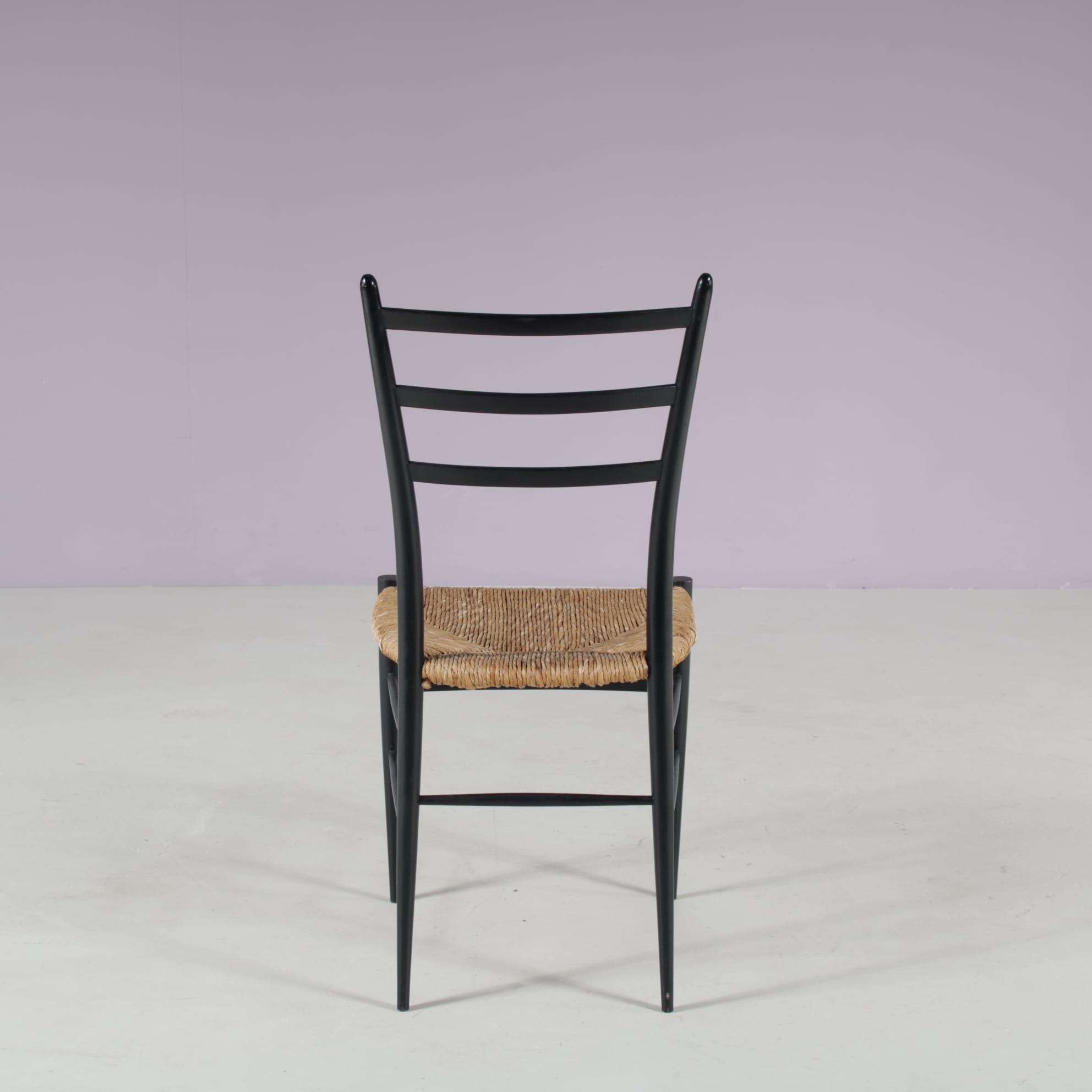 m28108 1950s Set of 4 Spinetto dining chairs in black wood with rush Chiavari, Italy
