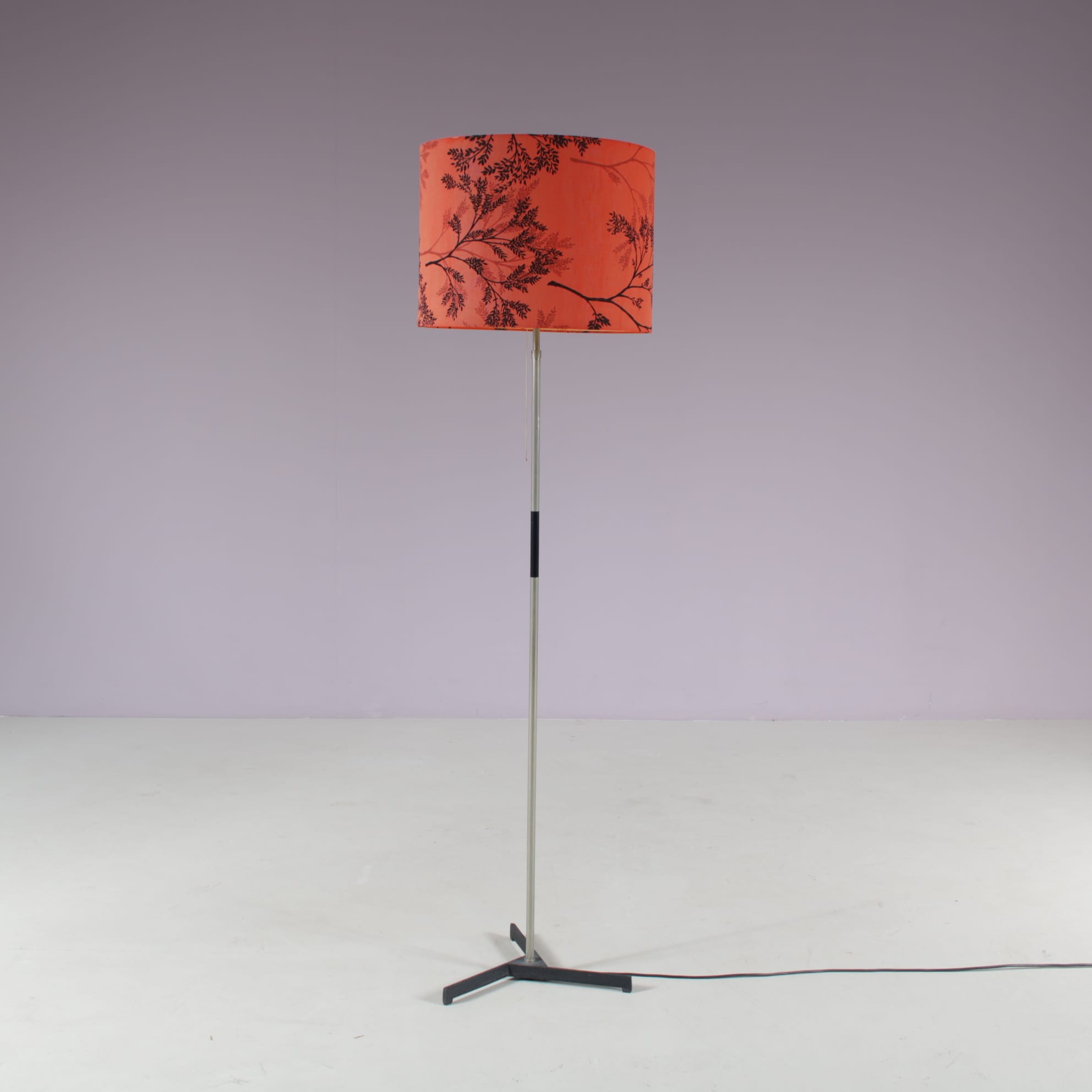 L5487 1960s Floor lamp on chrome plated metal base with black foot and red fabric shade Netherlands