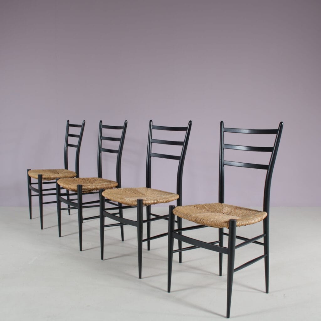 m28108 1950s Set of 4 Spinetto dining chairs in black wood with rush Chiavari, Italy