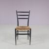m28108 1950s Set of 4 Spinetto dining chairs in black wood with rush Chiavari, Italy